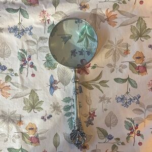 Vintage Magnifying Glass with Intricate Handle